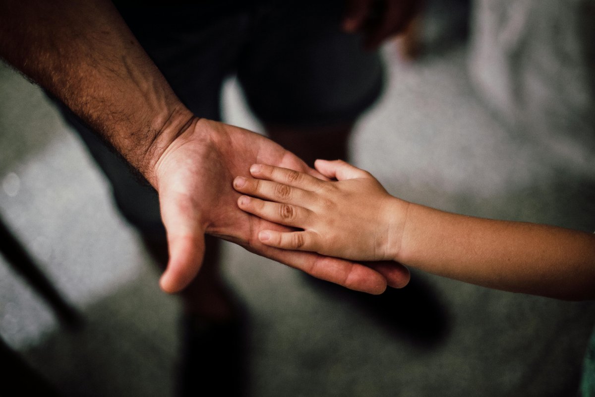 Hands showing parent-toddler bond