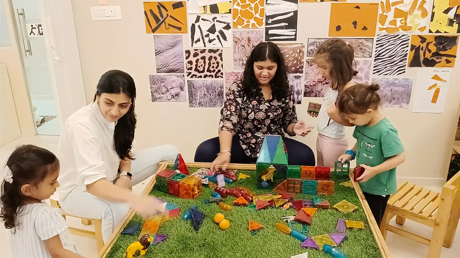 Child planning and building a structure with loose parts at Circles & Cycles, Bandra