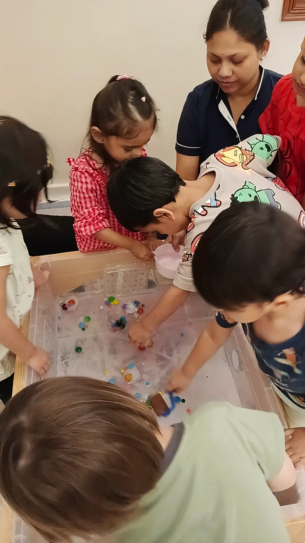 Preschoolers negotiating roles and working together on a shared project at Circles & Cycles, Bandra