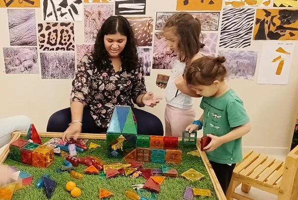 Reggio Emilia facilitator observing preschoolers during an investigation at Circles & Cycles, Bandra