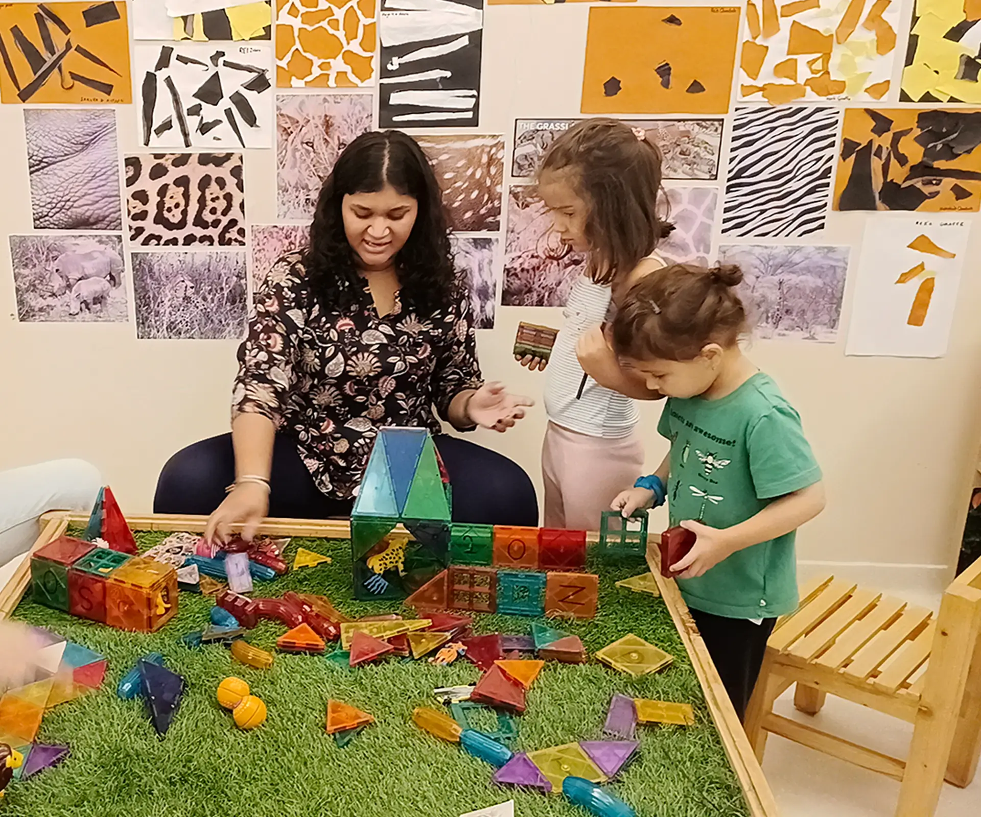 Reggio Emilia facilitator observing preschoolers during an investigation at Circles & Cycles, Bandra