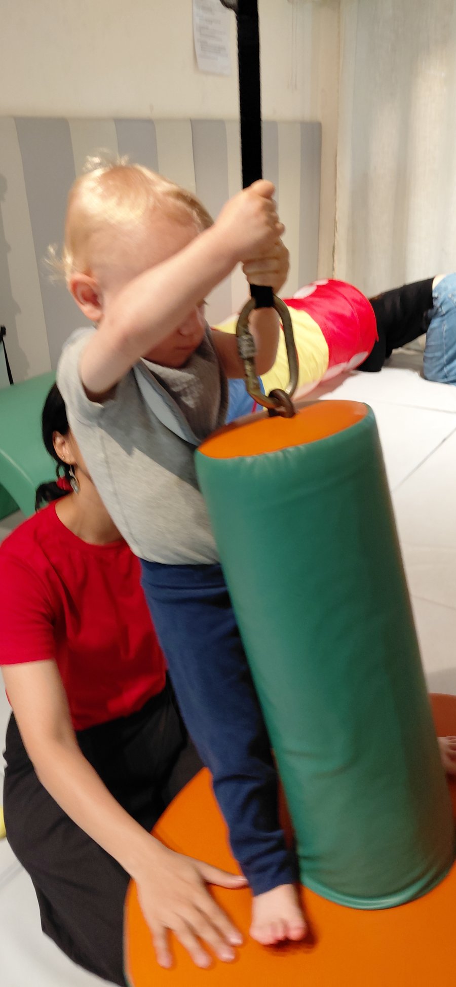 Two toddlers connecting and sharing a moment of play at Circles & Cycles, Bandra