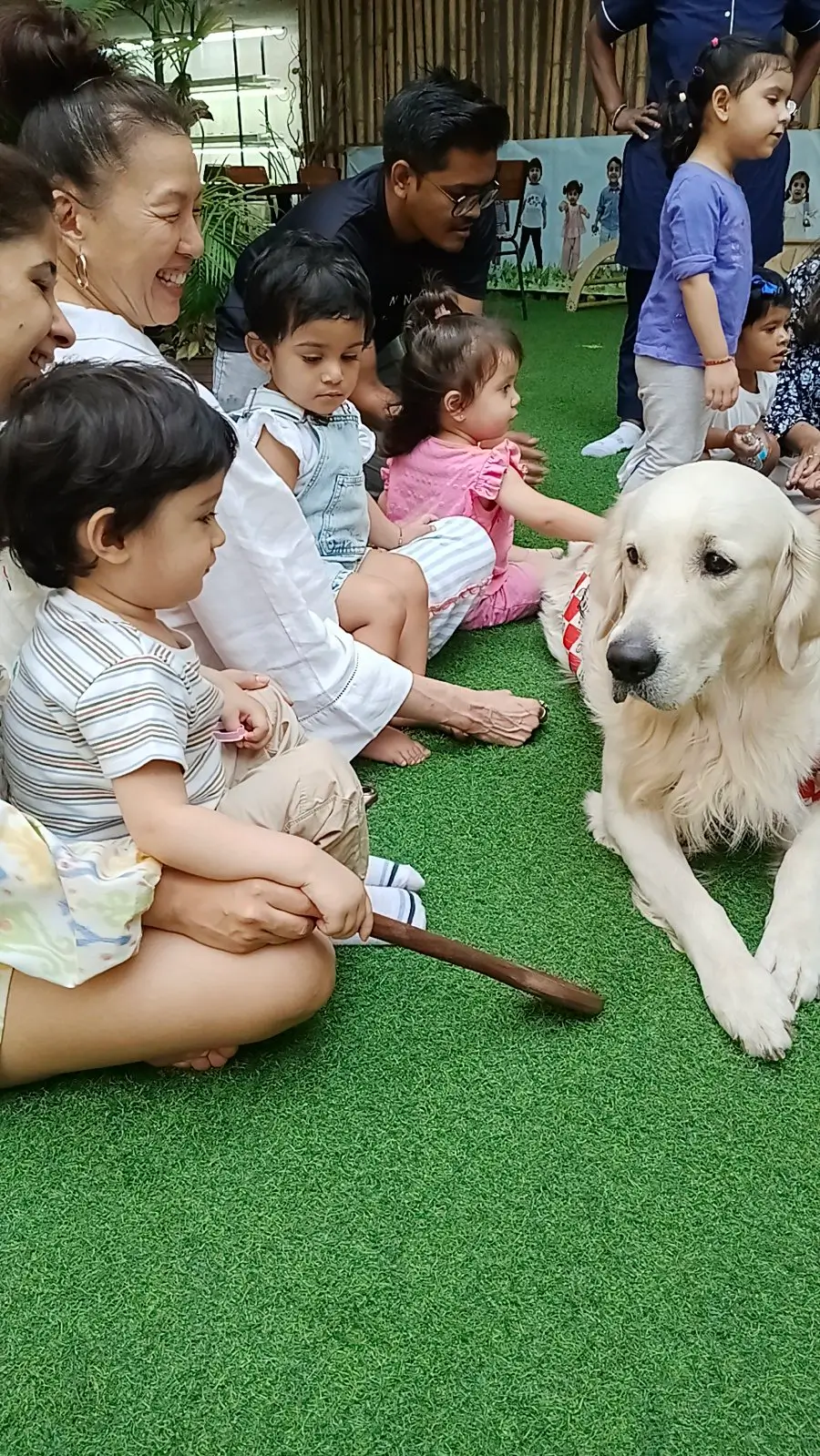 Educators and therapists collaborating around a child at Circles & Cycles, Bandra
