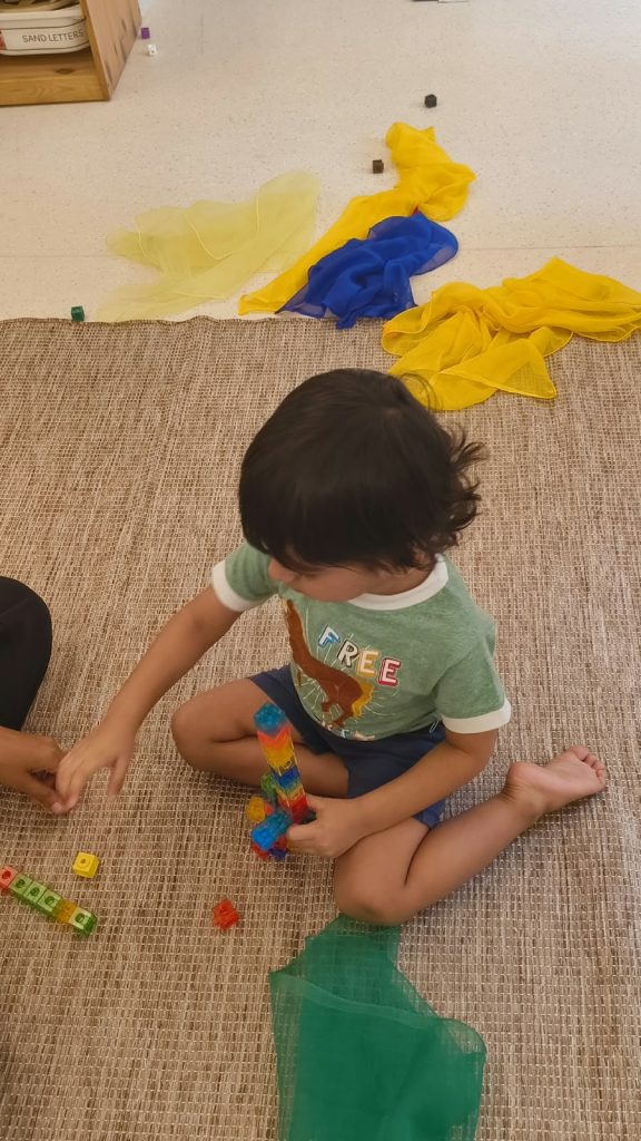 Toddler engaged in calm play at Circles & Cycles, Bandra