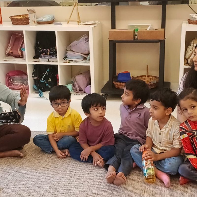 Facilitator calmly supporting a toddler through a big feeling at Circles & Cycles, Bandra